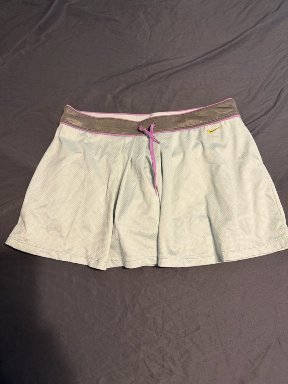 Nike Light Gray Skort with Pink Trim and Gold Swoosh